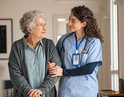 Nurse walking with patient